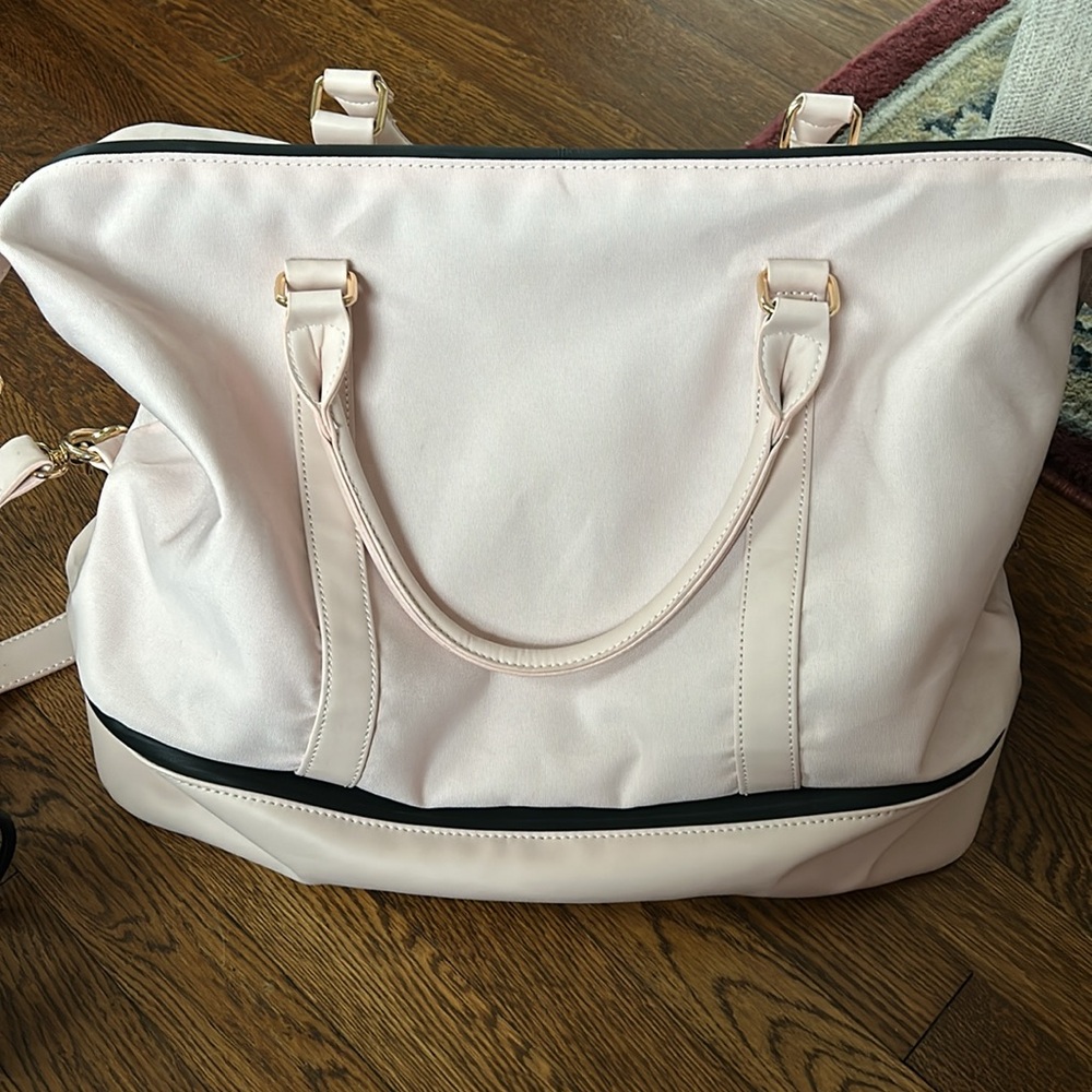 Pink weekender bag with shoe compartment